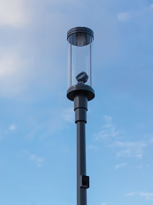 WE-EF ZFT470 LED-FT street luminaire with PMMA cylinder and integrated FLC121 projectors providing pathway and architectural lighting Bad Doberan spa town Germany