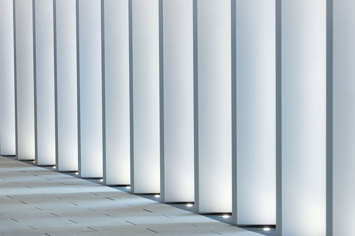 WE-EF ETC110 2W inground luminaires with narrow beam sharp cut-off distribution illuminating facade vertical elements at Zoom building Berlin