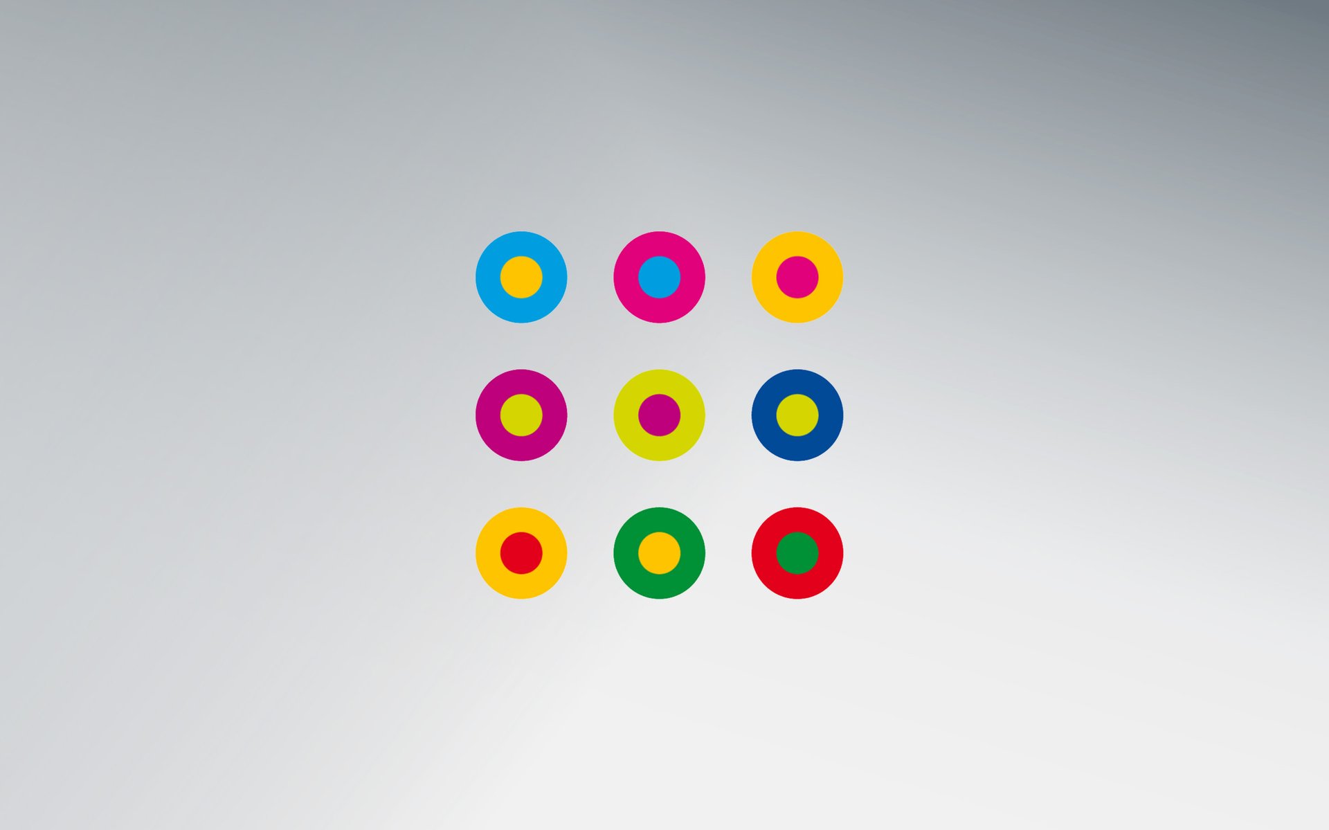 Nine colourful concentric circles on a grey background, the symbol of the Diversity Charter (Charta der Vielfalt)