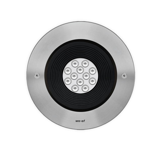 RGBW Colour Changer. IP69. IK10+. Stainless steel construction including PCS hardware. Safety glass lens; max. load 5 tonnes. Luminaire can be driven over at low speed. Silicone rubber gasket. Anti-wick technology, equipped with a cable gland and 0.5 meters of flexible, PVC-free cable.
Integral EC electronic converter. Advanced thermal management protects LEDs while optimising lumens output. Removable LED boards for upgrading. CAD-optimised optics for superior illumination and glare control. OLC® One LED Concept. LED circuit board with WE-EF Colour Boost Technology. DMX Interface. For other control interface options to suit specific project requirements, contact WE-EF.
Luminaire installation blockout and sealable junction box included in supply.